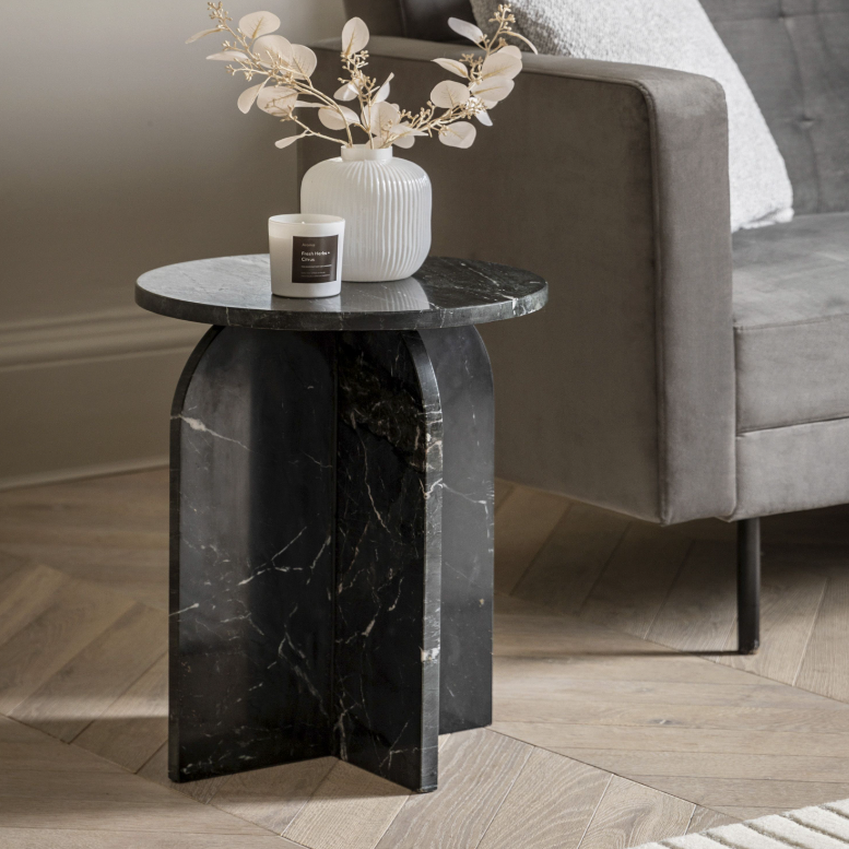 Elevate your home decor with this stunning modern side table, featuring a unique marble-effect finish and sculptural silhouette. Designed to be both functional and artistic, this round-top accent table is crafted with a bold, cross-shaped pedestal base that offers stability and visual intrigue. Its rich earth-toned pattern mimics natural stone, making it the perfect statement piece for living rooms, bedrooms, or stylish entryways.

Whether used as a drink table beside a velvet armchair or a chic display sta