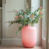 Elevate your space with this stunning pink glass vase, crafted from smooth, high-quality glass in a soft blush tone. Designed to add a touch of modern elegance, this minimalist vase is perfect for enhancing shelves, tabletops, or floor spaces with its sleek and glossy finish.

Ideal for use as a decorative statement piece or for displaying your favorite fresh or dried florals, this contemporary pink vase blends effortlessly with neutral palettes and modern home decor. Whether you're styling a chic living ro