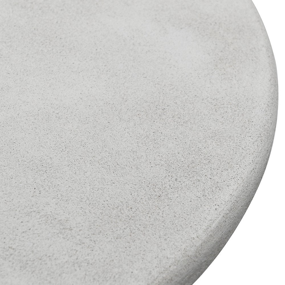 Close-up of the textured round tabletop – stone finish detail