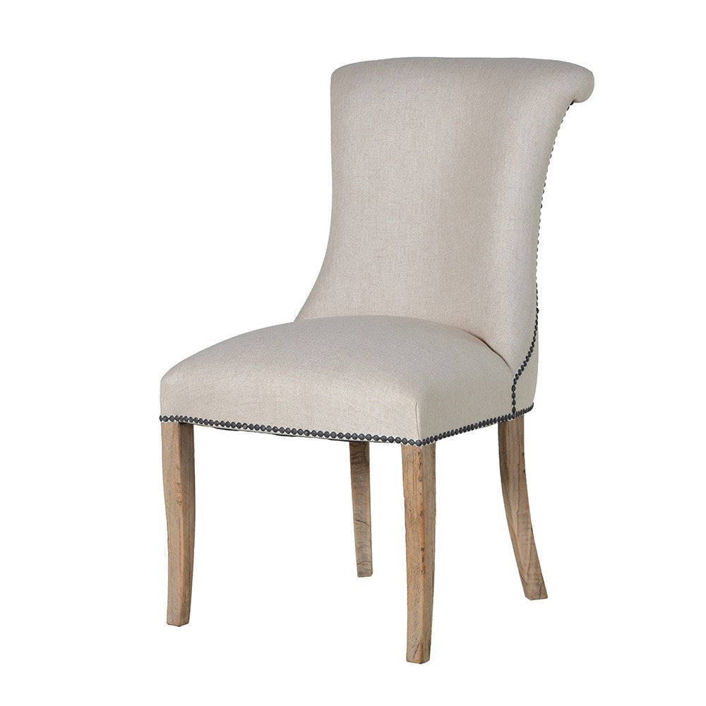 A striking dining chair in natural linen with stun detailing and ring back.