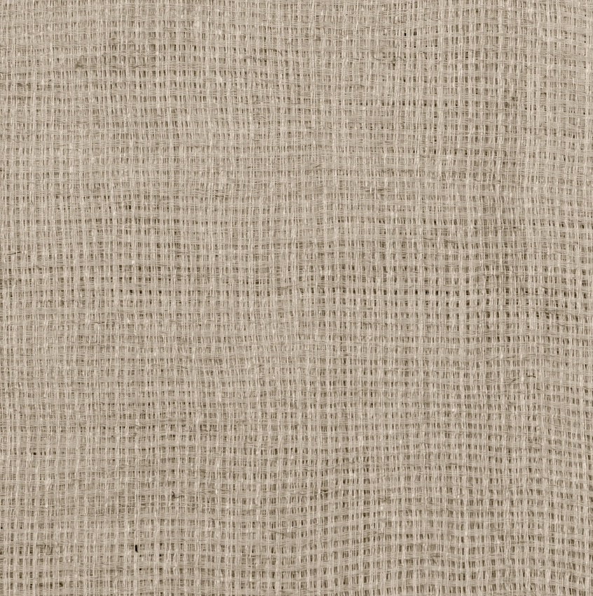 Close-up of a textured beige fabric surface