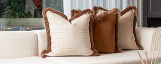Miserden champagne, chestnut and almond cushions together