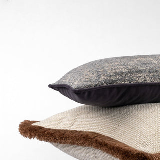 Duntisbourne dune rectangle cushion styled with other textured cushions