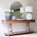 Crafted in a traditional style, the console is finished in a mid brown