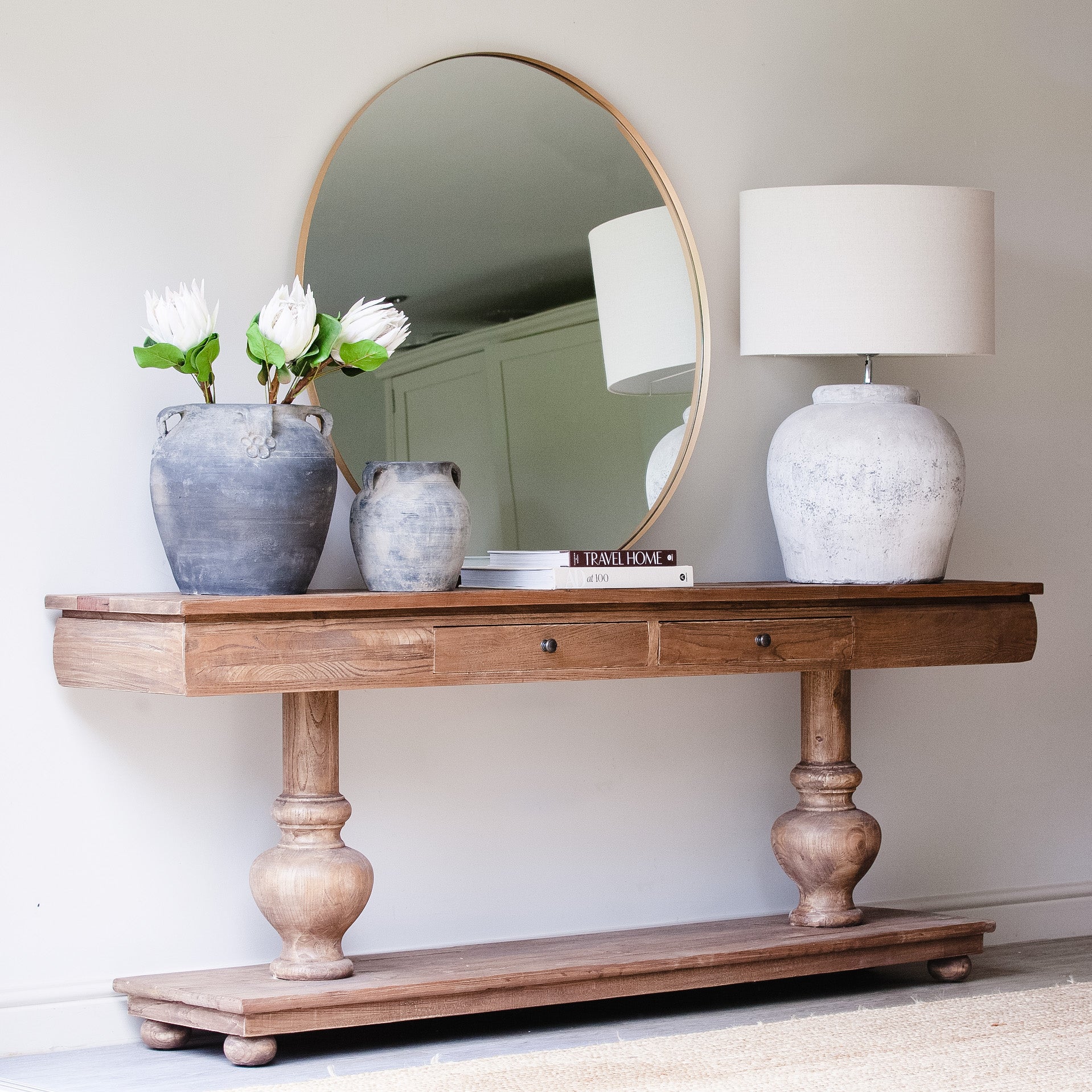 Crafted in a traditional style, the console is finished in a mid brown