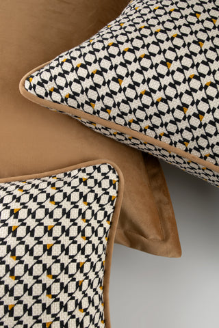 Filkins geometric rectangle cushion layered with square cushions