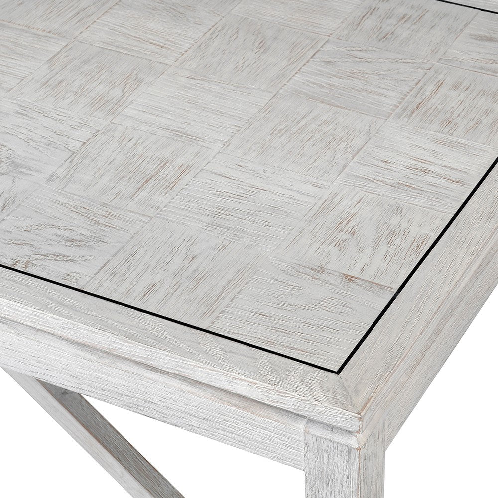 The Pasadena white oak coffee table is crafted from premium oak and oak veneer and finished in an off white with a square pattern detail.