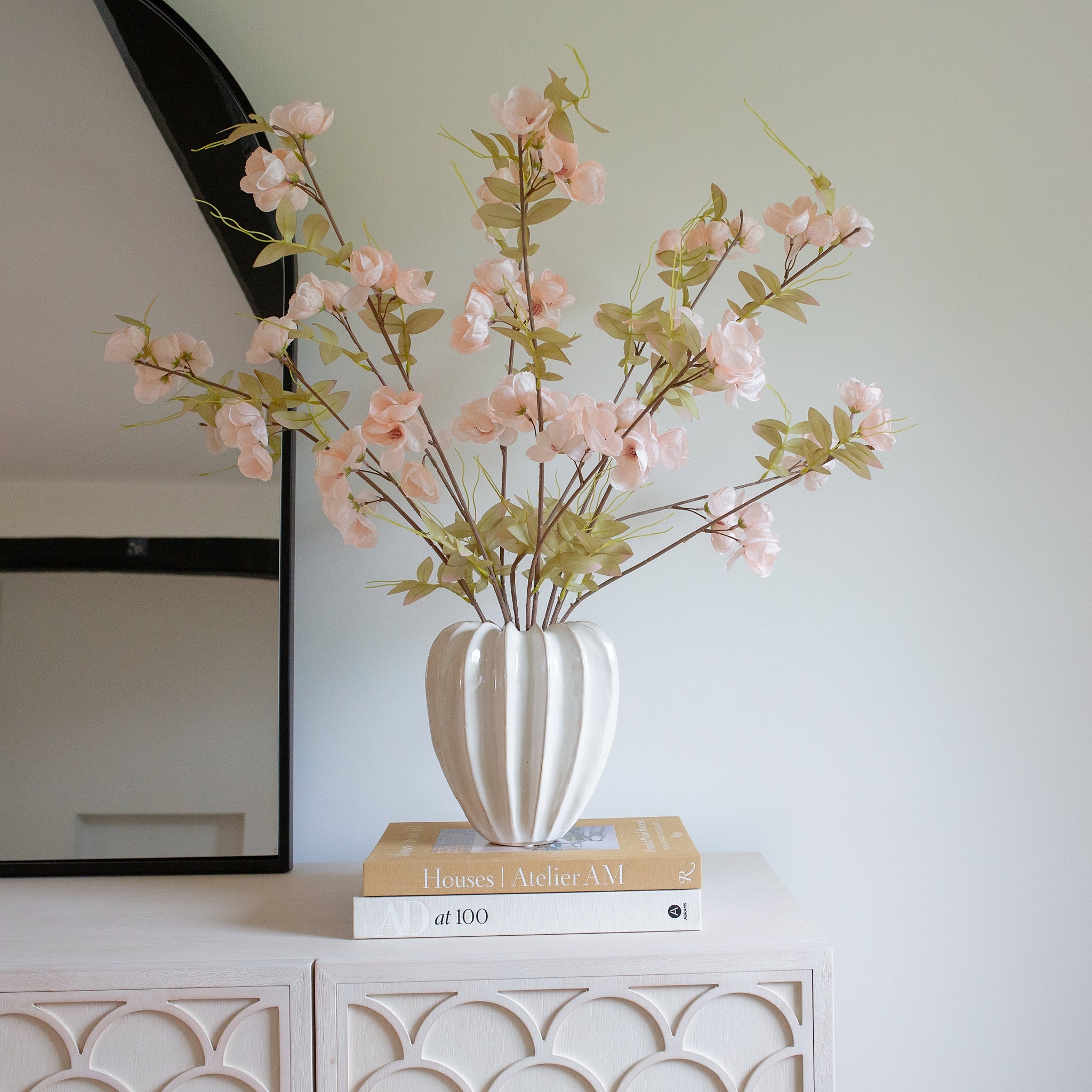 Textured off white glazed ceramic with ridged detail.