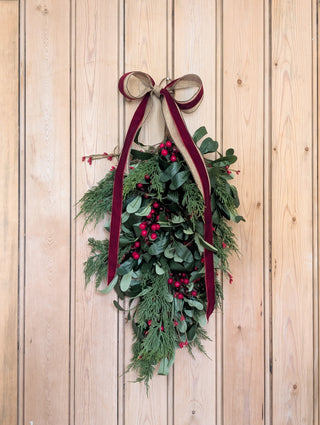 Olive leaf and red berry hanging Christmas swag