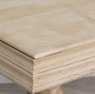 Close-up of Pemberton console tabletop showing limewashed mango wood grain and moulded edge