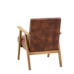 Brown leather armchair with wooden frame on a white background