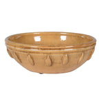 Handcrafted ceramic mixing bowl with amber glaze and raised teardrop accents – rustic artisan kitchenware