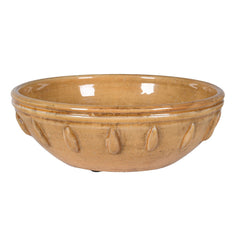 Handcrafted ceramic mixing bowl with amber glaze and raised teardrop accents – rustic artisan kitchenware