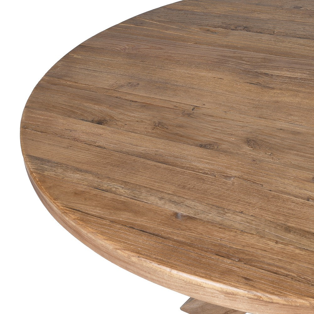 Close-up of natural wood grain and rustic finish on round reclaimed wood dining tabletop