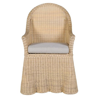 A single woven rattan armchair with a high curved backrest, light gray seat cushion, and skirted base, shown against a plain white background.
