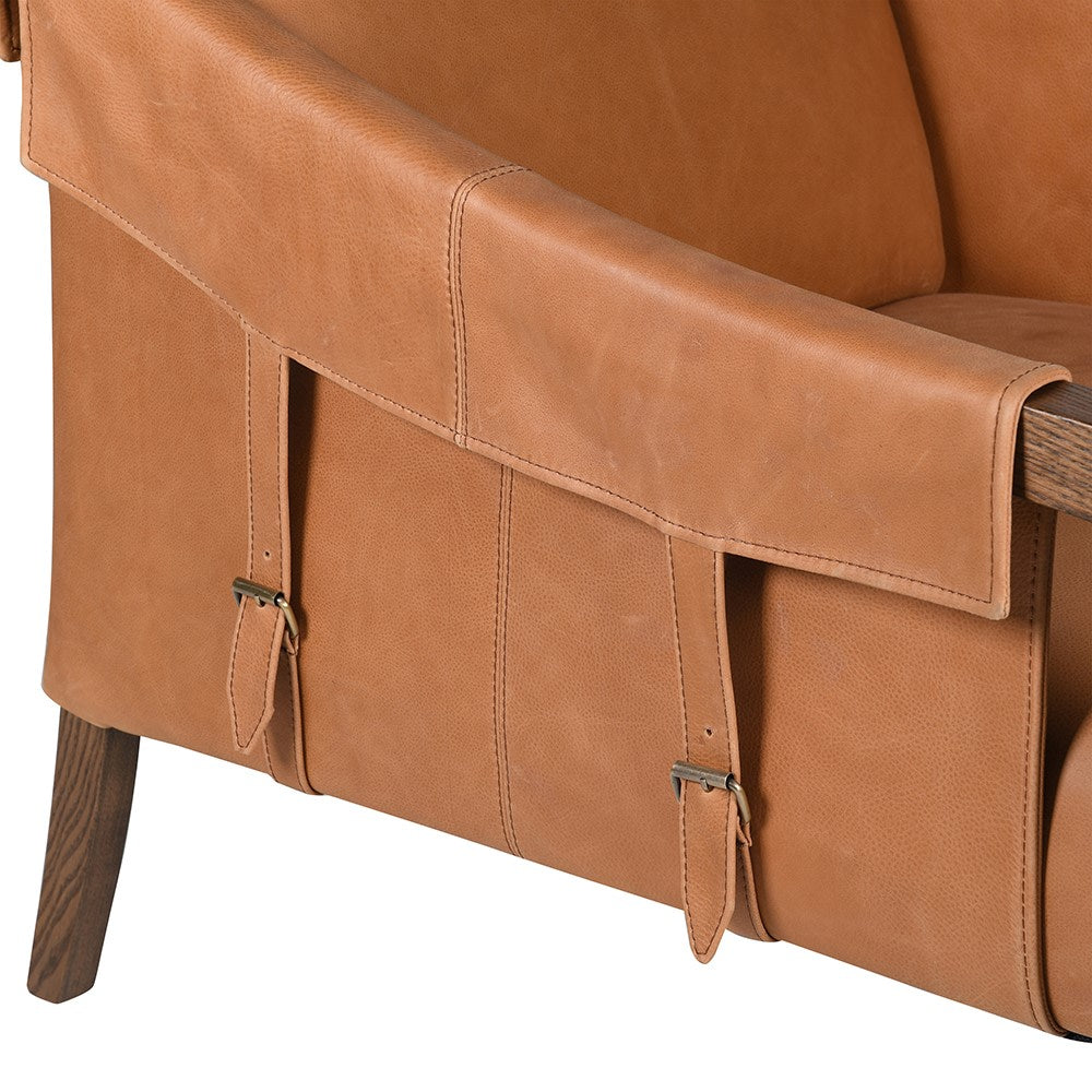 Close-up of buckle detailing on the leather side flaps