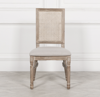 Salcombe rattan back dining chair with limewashed birch frame and natural linen seat, front view