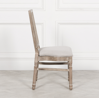 Side profile of the Salcombe dining chair with turned front legs and curved stretcher