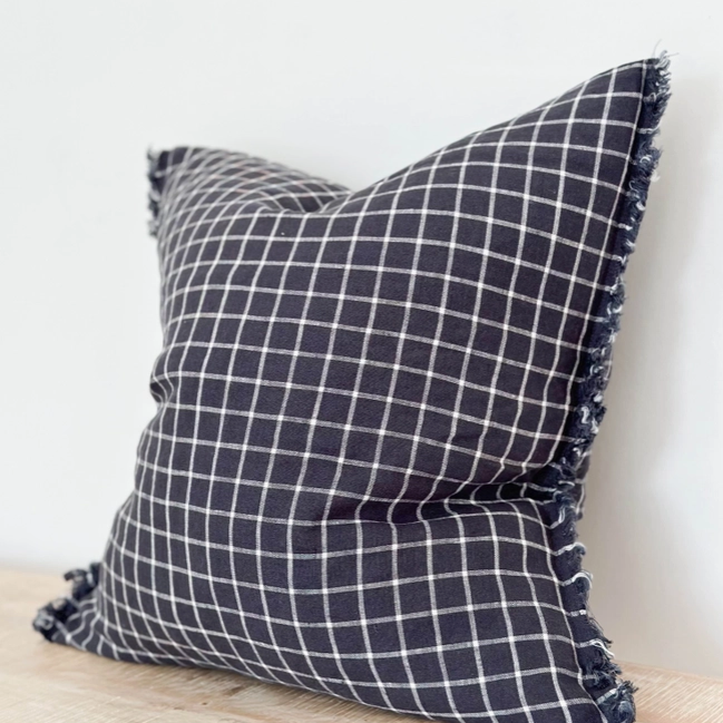 Navy Check Cushion, complete with a feather inner and adorned with a frayed edge and zip closure
