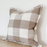 Large cushion with brown checker pattern