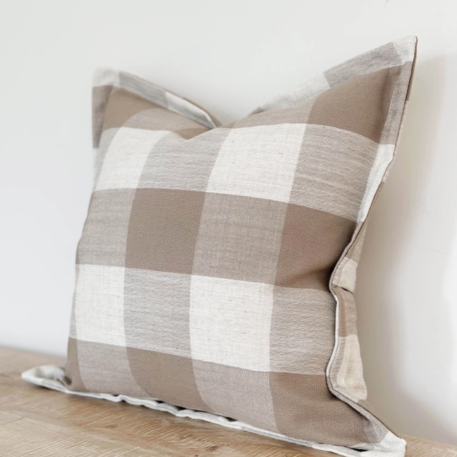 Large cushion with brown checker pattern