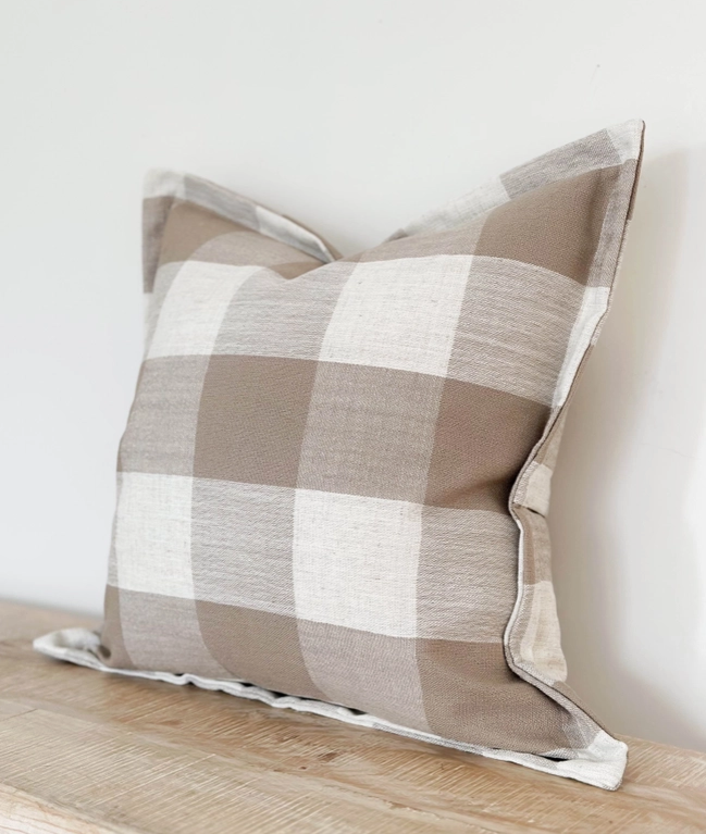 Large cushion with brown checker pattern