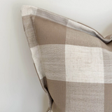 Large cushion with brown checker pattern