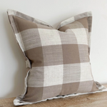 Large cushion with brown checker pattern