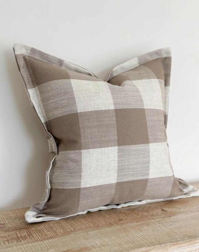 Large cushion with brown checker pattern