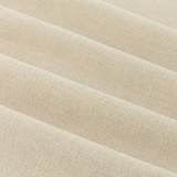 Close-up of beige fabric with a textured pattern