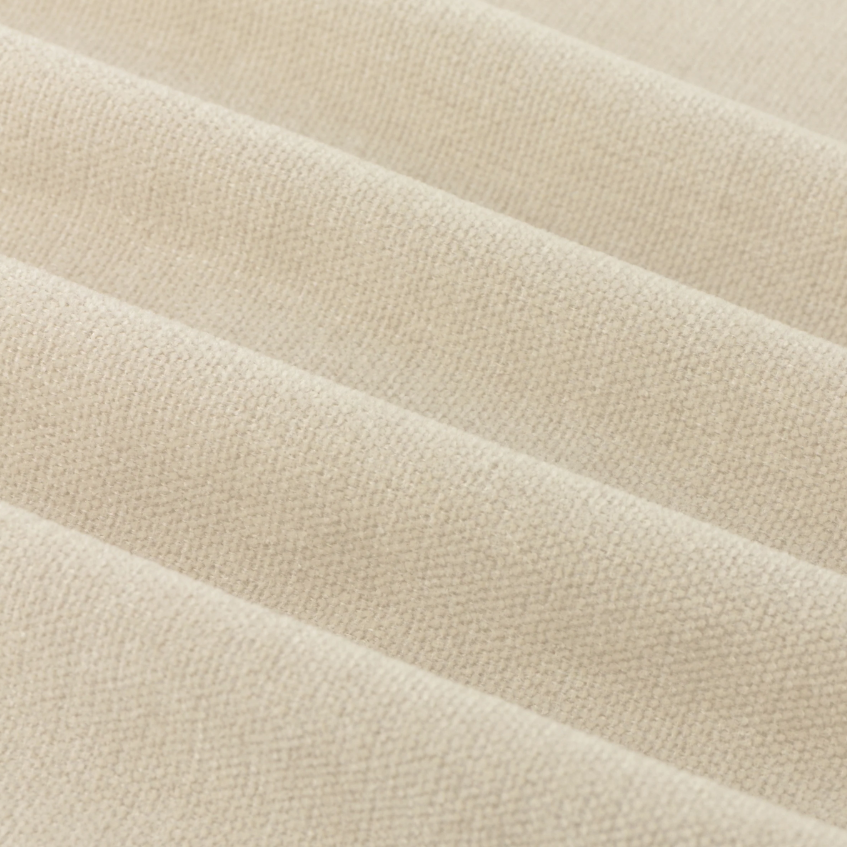 Close-up of beige fabric with a textured pattern