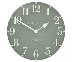Round wall clock with white numbers and hands on a light gray background, featuring the brand 'Tho: Kent'.