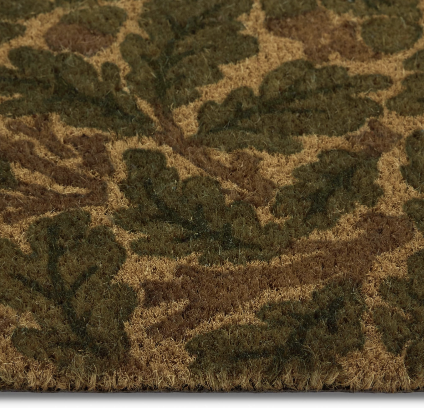 Oak leaf print on a natural coir doormat