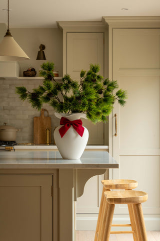 Large and small red felt Christmas bows with long tails