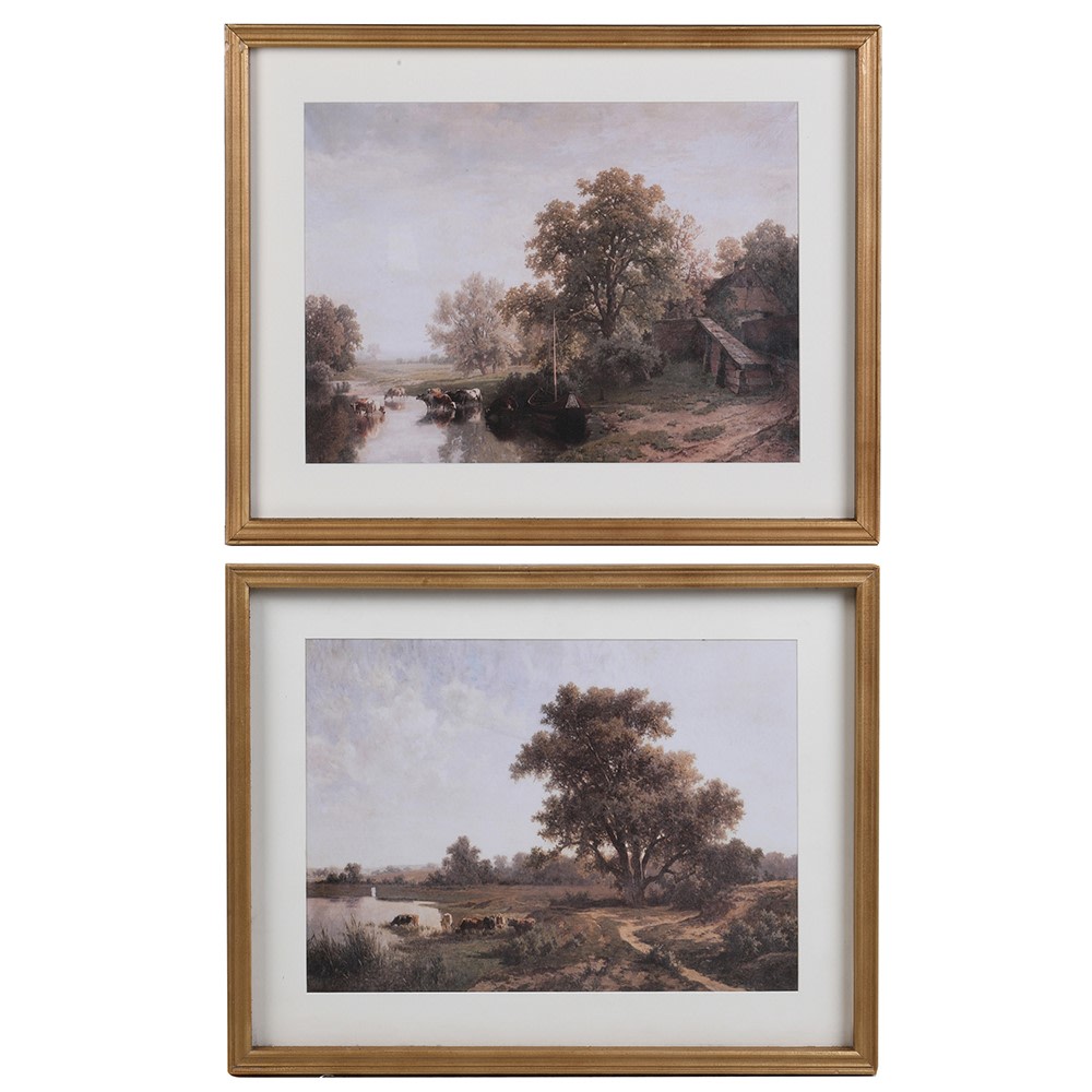 Set of two framed landscape art prints featuring pastoral countryside scenes in classic wooden frames