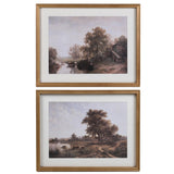 Set of two framed landscape art prints featuring pastoral countryside scenes in classic wooden frames