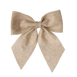 Beige bow on a white background