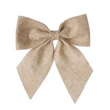 Beige bow on a white background