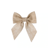 Beige bow on a white background