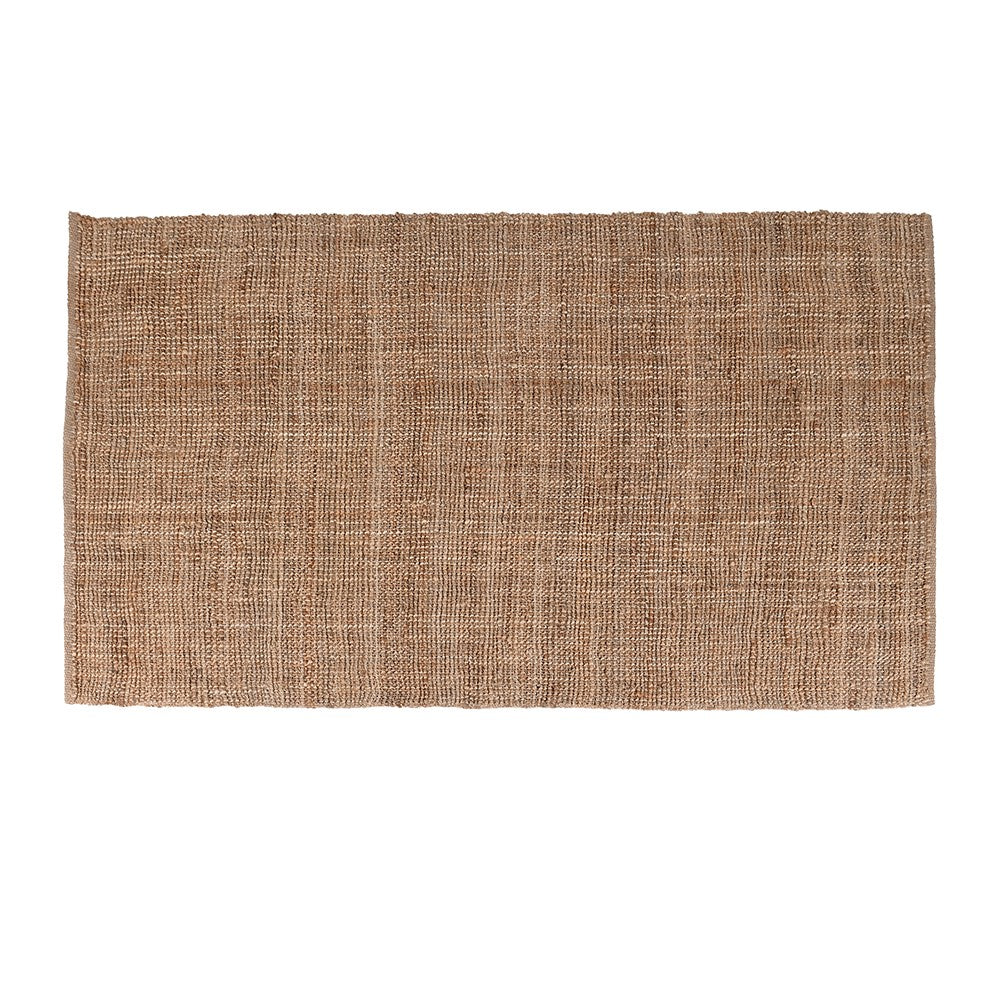 Handwoven jute rug in earthy neutral tones