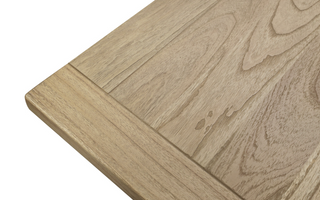 Corner close-up of the Stourton mindi wood top, showing the panelled edge, moulded lip and limed finish