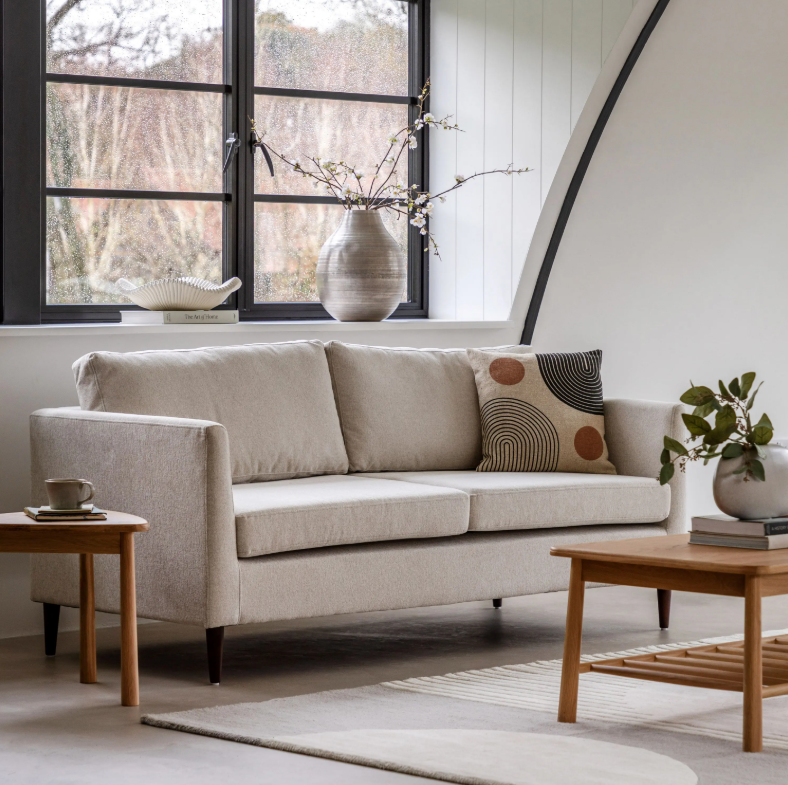 Sunningdale soft grey fabric sofa with deep seat, tapered arms and turned legs in modern living room