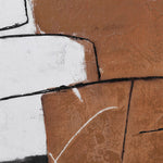 Close-up of textured abstract canvas print with geometric shapes in earthy tones.