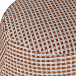 Close up of terracotta and cream check woven fabric footstool