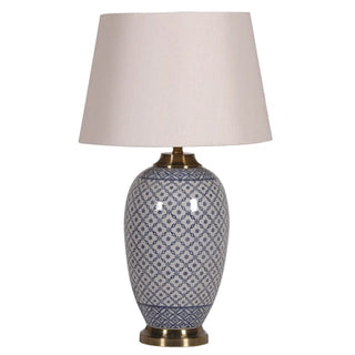 Tetbury blue lattice ceramic jar lamp with white ceramic base, blue diamond-and-floral pattern, antique brass hardware and a tapered natural linen shade, photographed against a white background