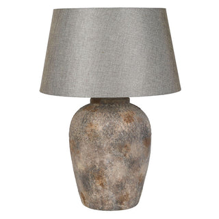 Tintagel aged terracotta table lamp with weathered stone finish and grey linen shade