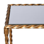 Close-up of Torsia Console Table gold twist frame and mirrored glass top