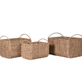 Set of three water hyacinth baskets in different sizes with handles