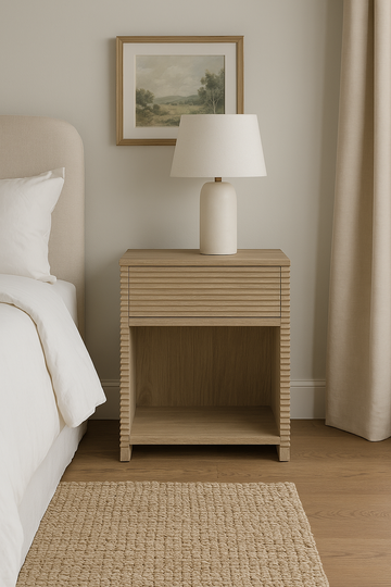 Wenlock bedside table in oak and oak veneer, MDF. Ribbed side panels and front drawer. Cubby hole. Drawers on metal runners, visible grain.

Dimensions:

W45cm H60cm D40cm

25kgs