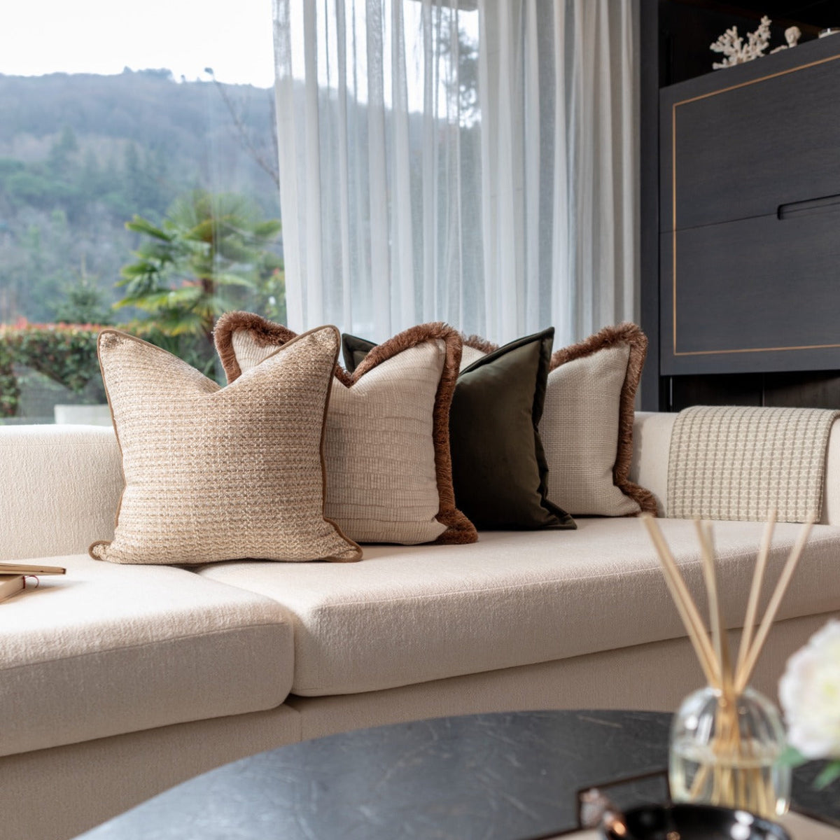 Sapperton cushion quartet in juniper green, anise green, champagne and dune